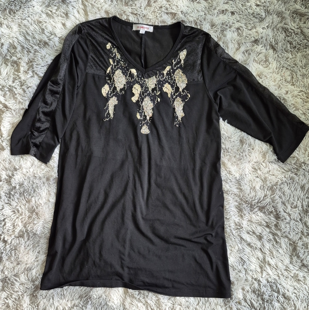 Elegant Black Top with Gold Accents